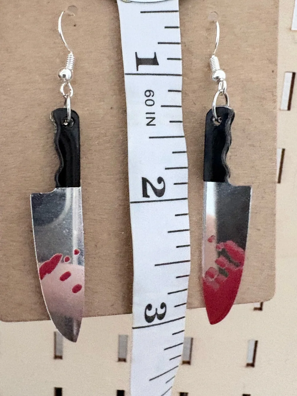 Handcrafted bloody knife charms dangle earrings